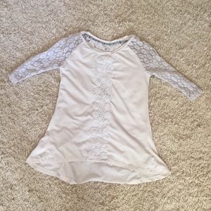 Cream colored blouse with short lace sleeves